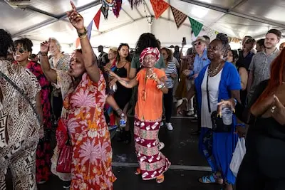 Visitors at Kwaku Festival during Roze Zondag in Nelson Mandela Park, Amsterdam-Zuidoost