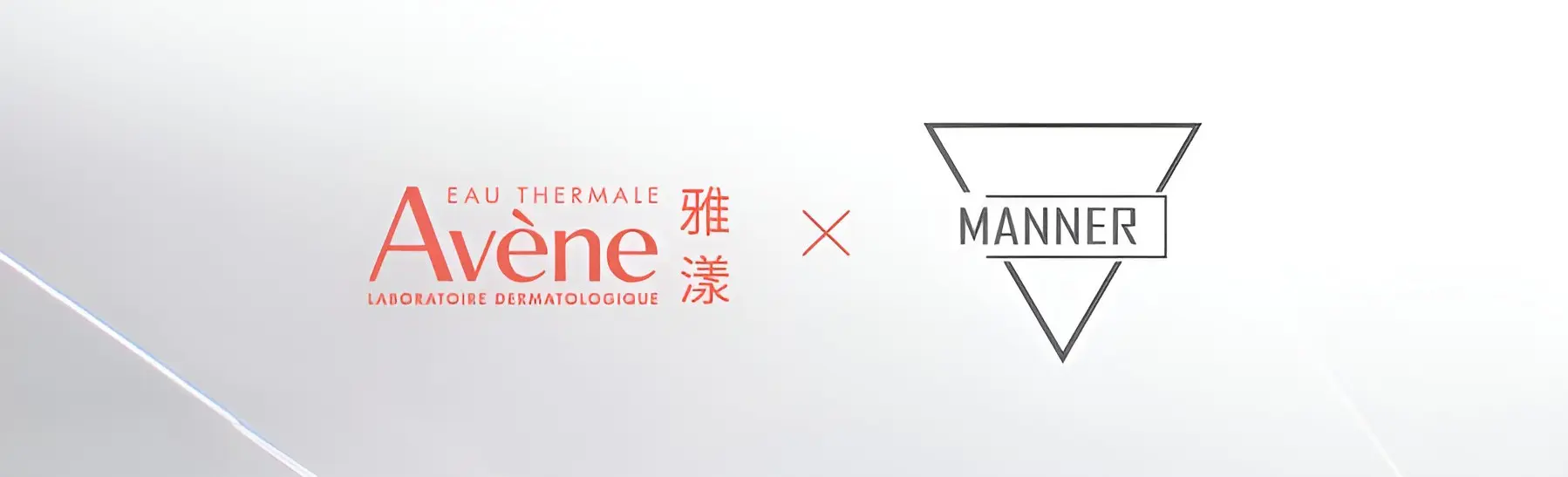 Avène skincare sample pack displayed alongside a Manner coffee cup in a promotional shot