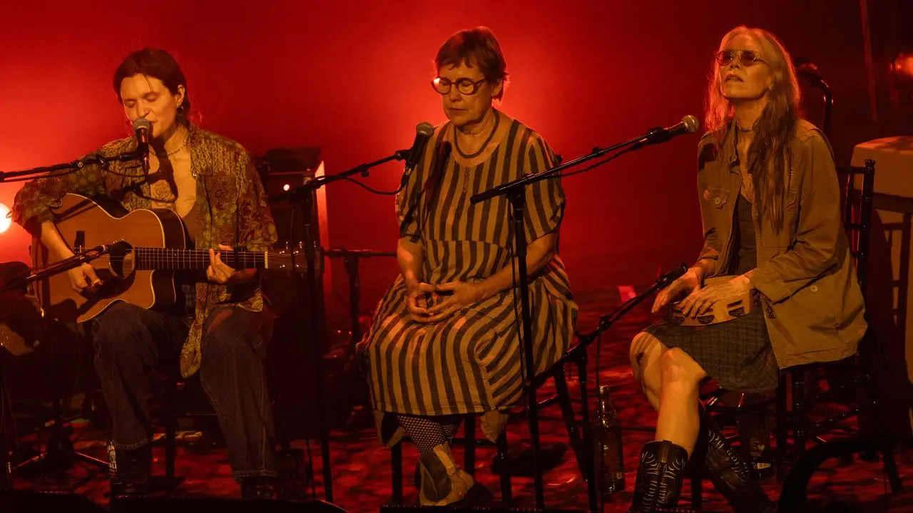 Big Thief and guest musicians performing at the Ryman Auditorium