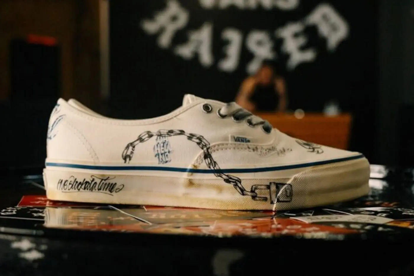 Hand-sketched graphic detail on the Authentic 44 upper credited to Alex Erdmann