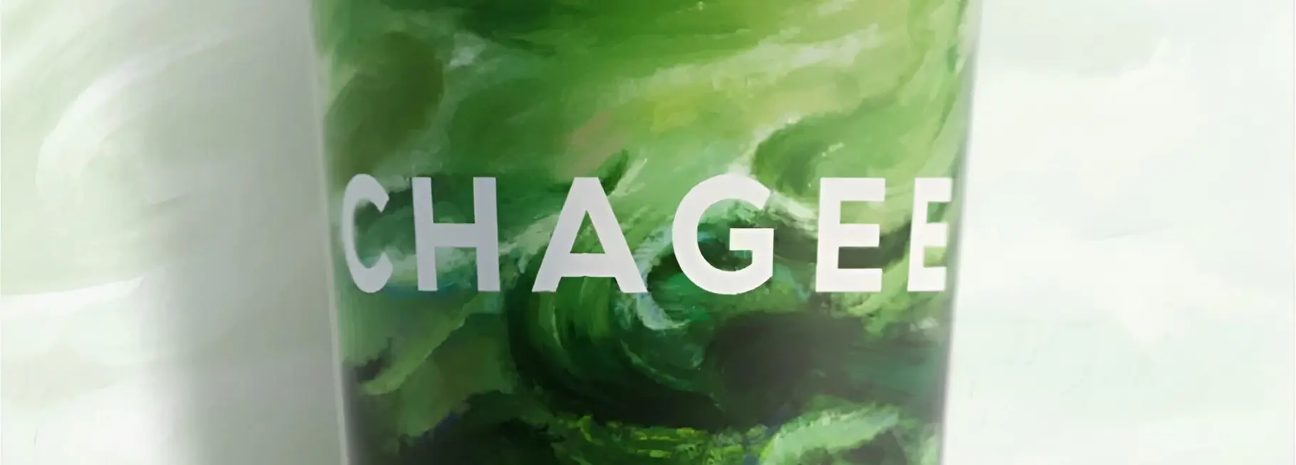 Chagee x CLOT branded matcha cups and packaging arranged in a promotional flat lay