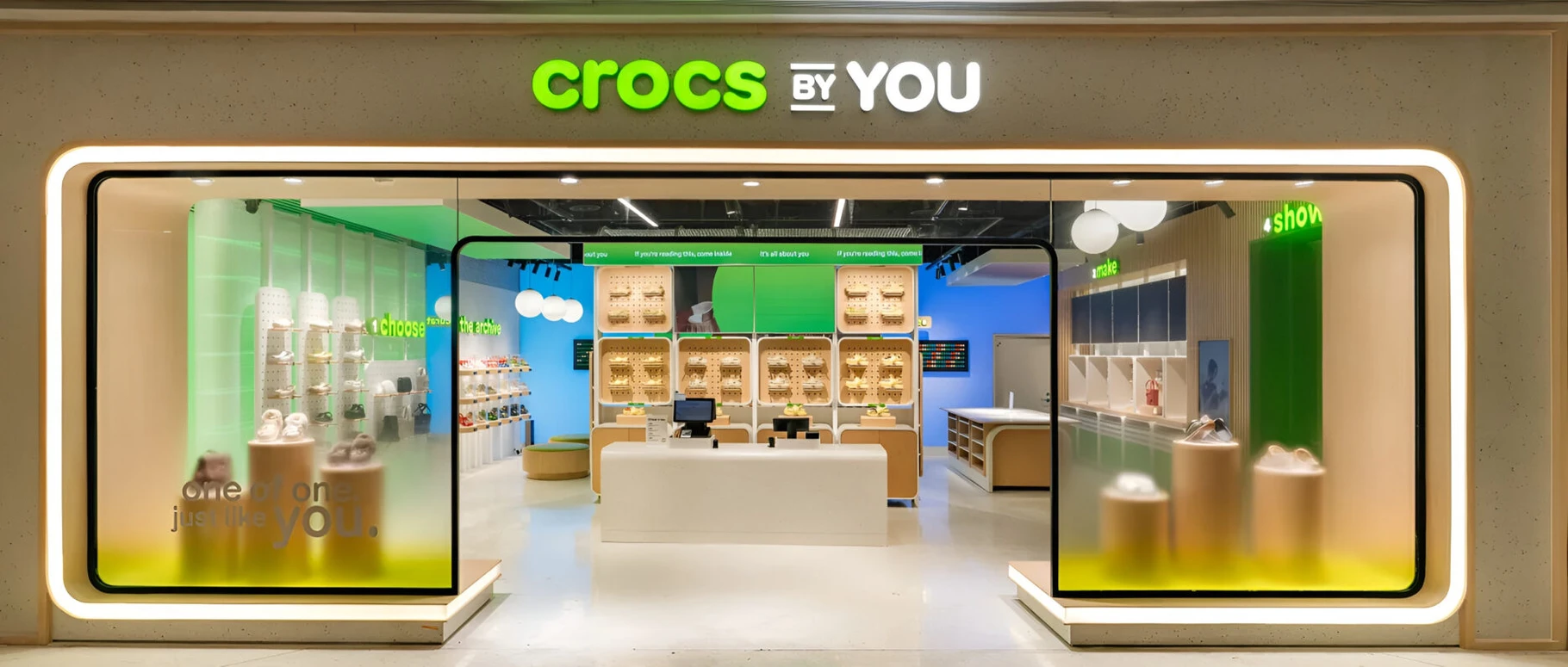 Wide interior view of the Crocs by You store in Wuhan showing the customization wall