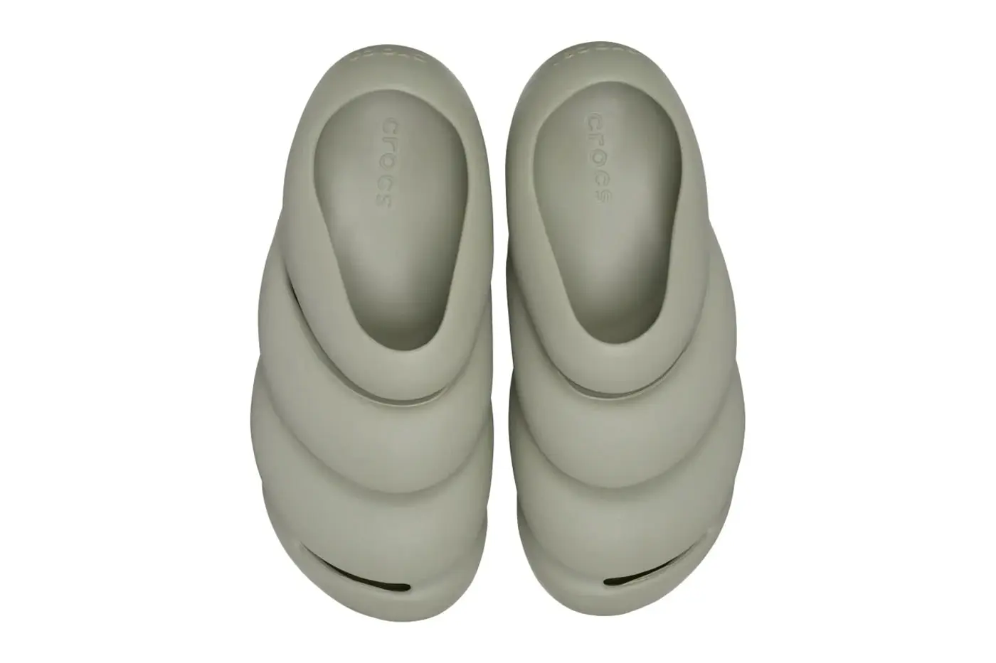 Crocs ROY outsole view showing integrated flex grooves in grey foam