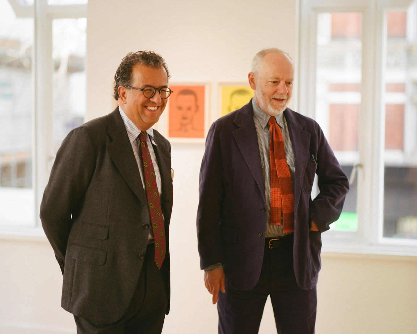 Editorial photograph of Hisham Matar and David Austen seated together, published by Drake's to mark their joint exhibition