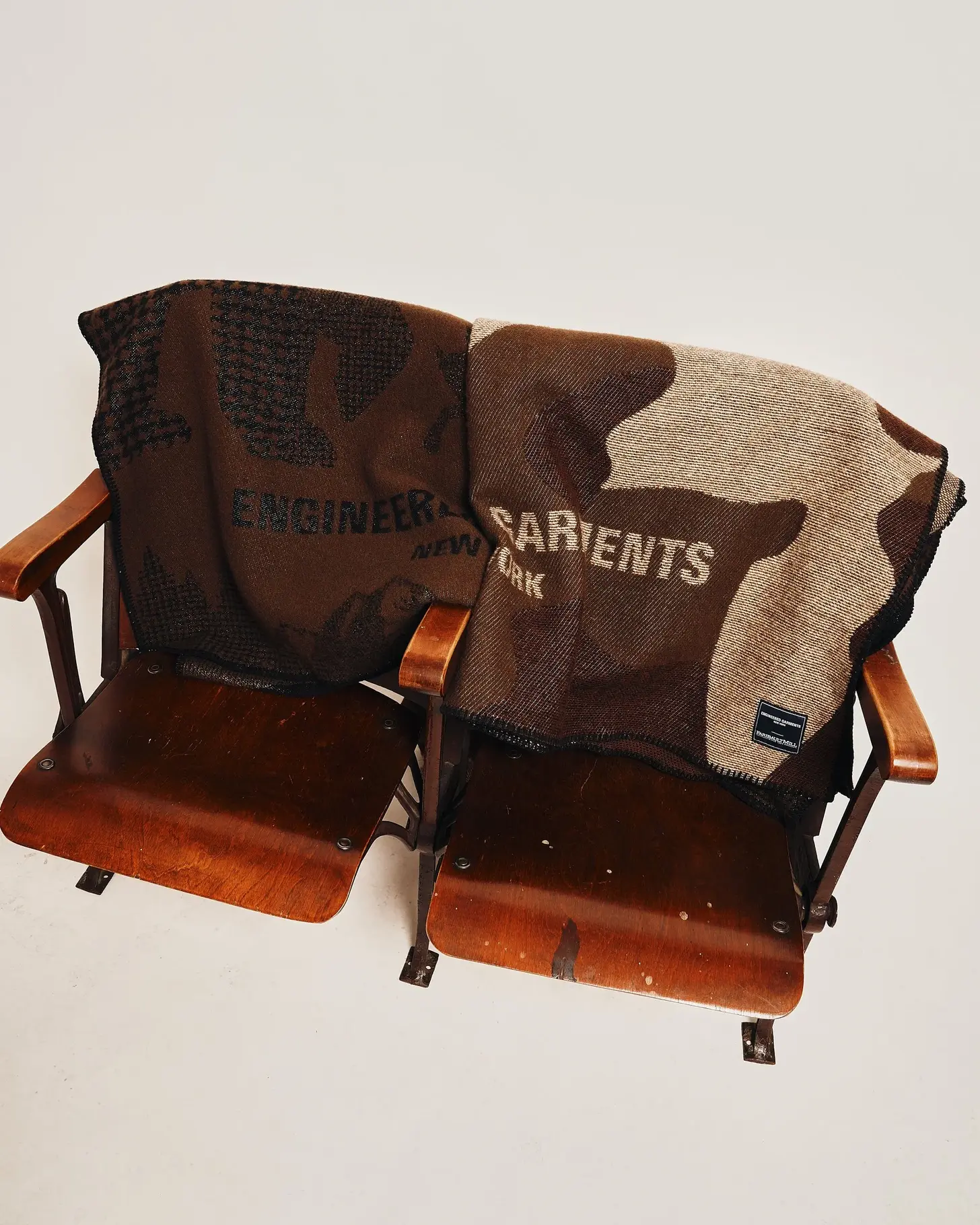 Engineered Garments FW26 throw blanket styled in a domestic interior setting