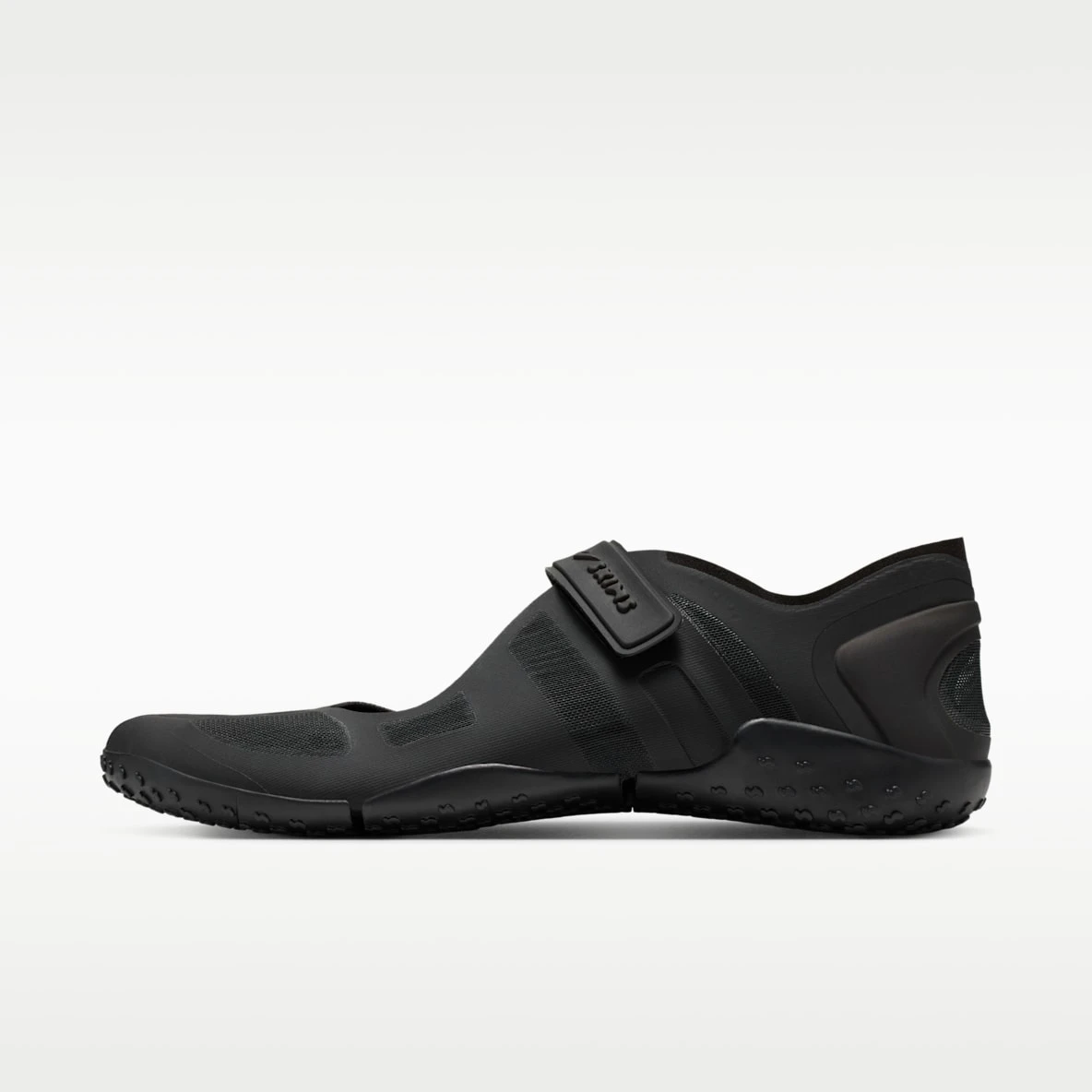 The Nike Rift Rocker by Melitta Baumeister, a tabi-toe sneaker with a crackled upper and chunky rocker sole