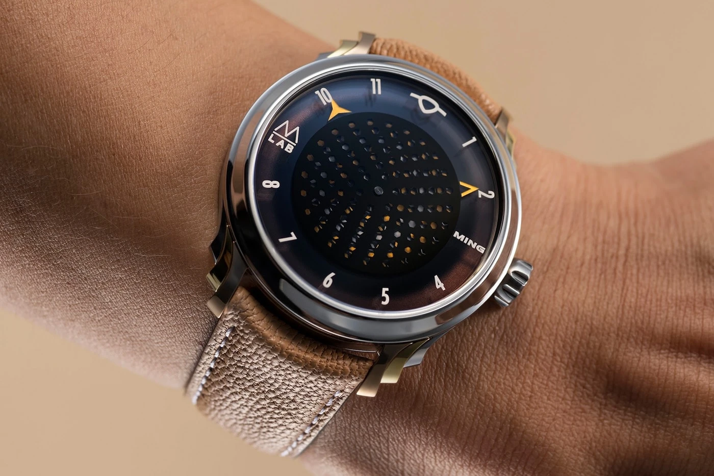 Side profile of the tri-tone titanium case of the 57.09 Secret Honey