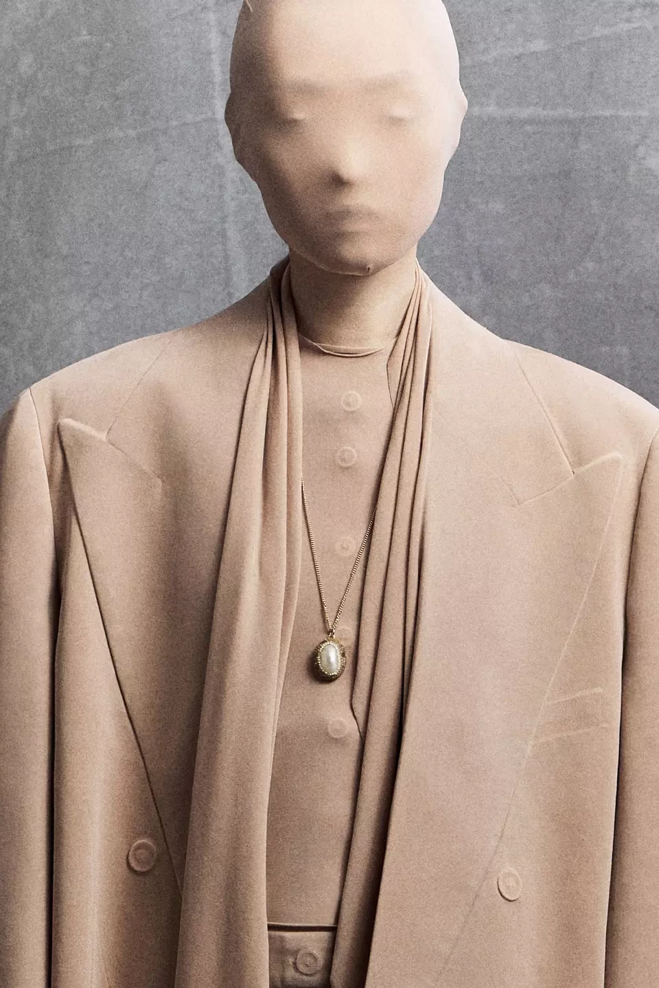 MM6 FW26 campaign image showing a separate garment with exposed internal lining