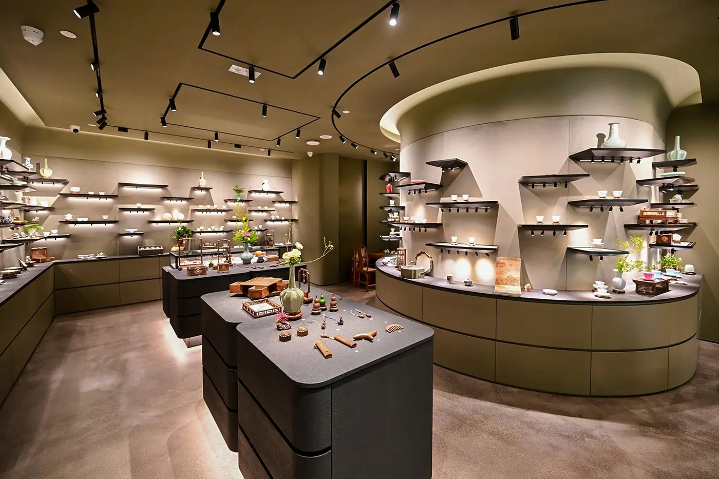 Wooden shelving and low lighting inside Nan Shufang's Pacific Place store in Hong Kong