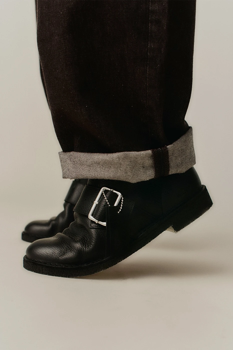 Detail of the NN.07 x Clarks Originals Wallabee strap hardware
