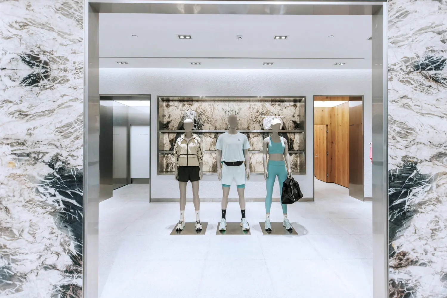 Shoe display wall inside On store at Parque Arauco