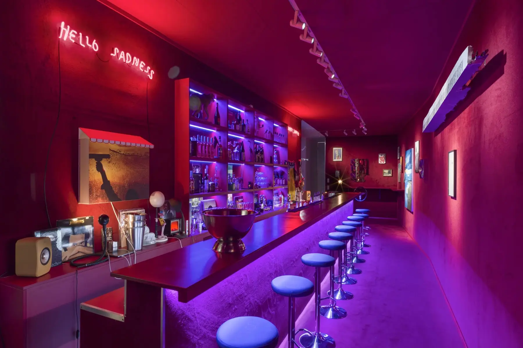 Installation view of Bar Va Bene at Pace Berlin, Friedrich Kunath's recreated studio bar centered in gallery space