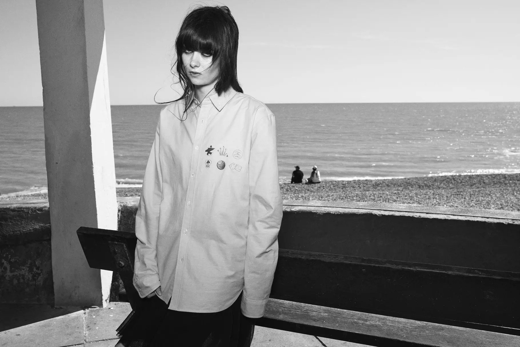 Third look from the collaboration, deconstructed tailoring detail visible