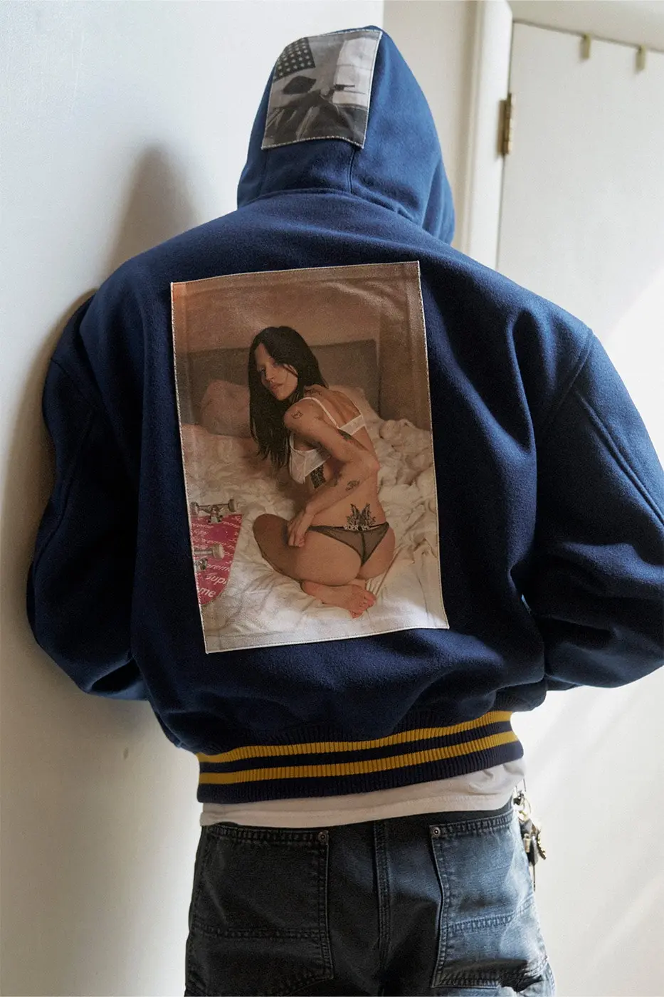 Supreme x Larry Clark bean bag upholstered with Tulsa photography inside a fitting room