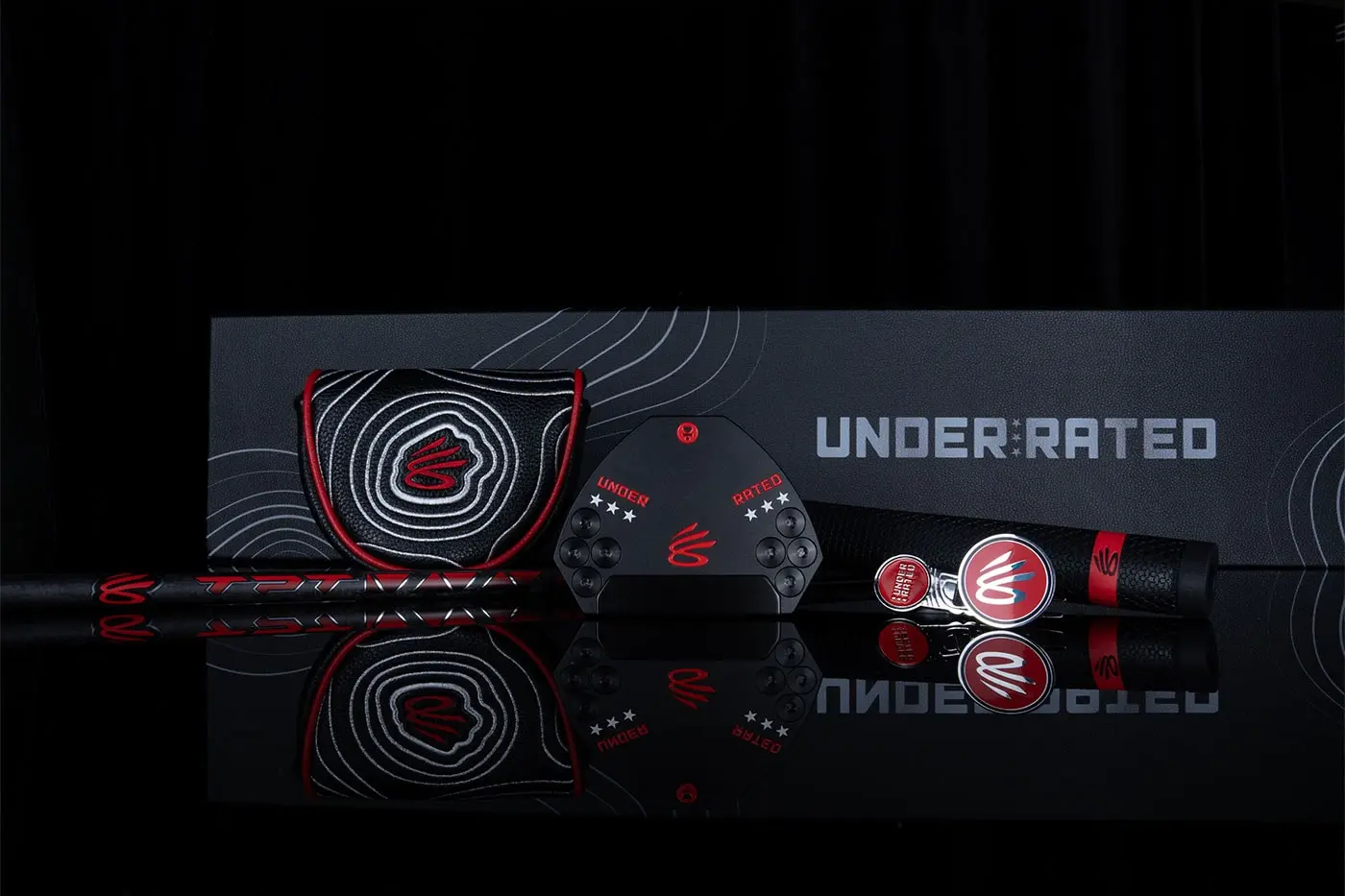 Close-up of the OZ.1i putter head with UNDERRATED branding
